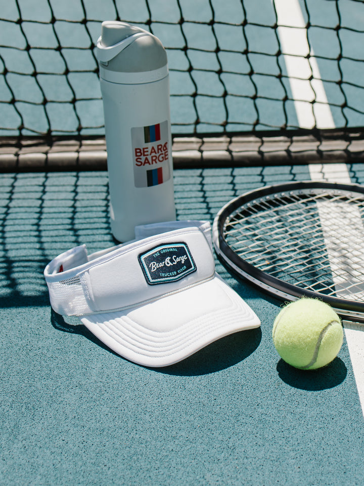White Retro B+S trucker visor with tennis racquet and ball at the net — Bear & Sarge